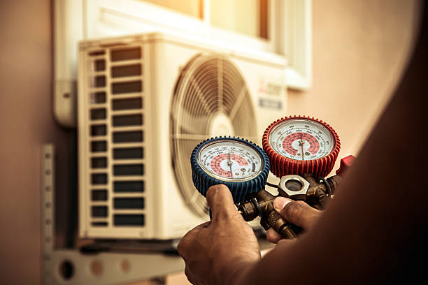 Professional Heat Pump Repair technician working in Greenville, OH